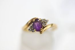 A 9 carat gold amethyst and diamond cluster ring,
