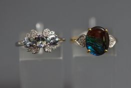 A 9 carat gold opal triplet and diamond ring,