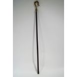 An ecclesiastical style crook with brass top,