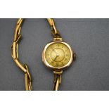 A lady's 9 carat gold wrist watch,