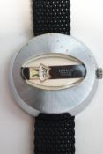 Loraine, a vintage jump hour digital watch with manual wind,