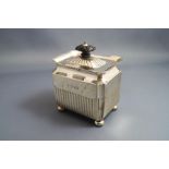 A late Victorian silver tea caddy, makers mark rubbed, London 1895, of rectangular outline,