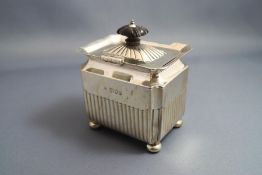A late Victorian silver tea caddy, makers mark rubbed, London 1895, of rectangular outline,