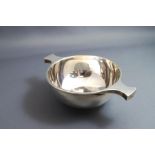 A Scottish silver quaiche, by Brook & Son, Edinburgh 1921, of traditional plain form, 15 cm across,