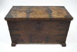 An 18th century style continental oak metal bound chest,