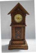 A miniature longcase clock of architectural form, with stained decoration,
