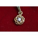 A 9 carat gold diamond pendant, the small brilliant cut of approximately 0.