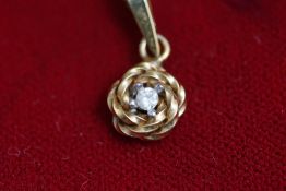 A 9 carat gold diamond pendant, the small brilliant cut of approximately 0.