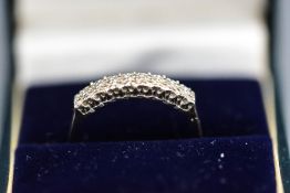 A 9 carat gold diamond half hoop ring, set with eighteen single cuts, finger size U, 2 g gross,
