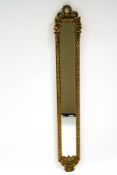 A rectangular wall mirror with bevelled glass and gilt frame, 131.