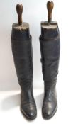 A pair of Gentleman's black leather riding boots with original trees