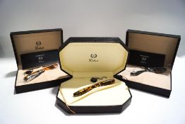 A marbled black and grey celluloid Laban fountain pen, cased with booklet,