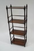 A Victorian mahogany four tier whatnot,
