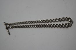 A silver Albert watch chain, of graduated curb links, with swivel and T bar, 35 cm long,