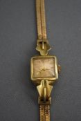 A lady's wristwatch, stamped '585',
