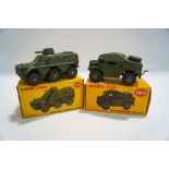A Dinky 676 Armoured personnel carrier, boxed and a 688 Field Artillery tractor,