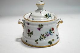 A Meissen style two handled bowl and cover, painted with flowers,