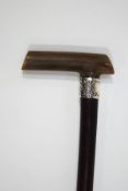A mahogany shafted walking stick with horn handle and 1" wide 1896 Birmingham silver collar