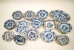 A Meissen onion pattern composite dinner service, comprising four serving dishes,