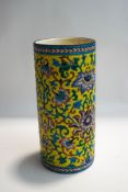 A French Longwy cylindrical vase, with all over enamel decoration of stylised flowers,