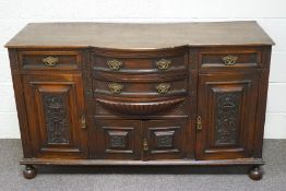 A Victorian mahogany sideboard with bow fronted central section,