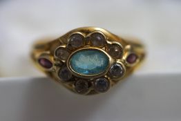A continental cluster ring, stamped 750, finger size N1/2, 2.