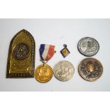 A George III Coronation medal, a WWII medal, a National Rose medal, two further,
