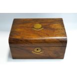 A Victorian walnut sewing box with interior removable tray,