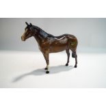 A Beswick brown glaze horse, paper label,
