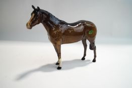 A Beswick brown glaze horse, paper label,