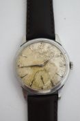 Omega, a gentleman's stainless steel manual wind wrist watch,