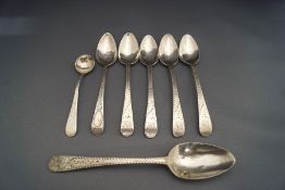 A matched set of five Georgian silver bright cut tea spoons;