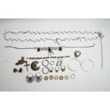 A collection of silver and silver coloured jewellery,