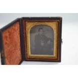 A Victorian Ambrotype of a seated gentleman, 6.