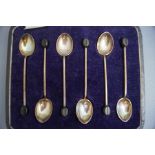 A set of six Walker & Hall silver bean end coffee spoons, 37 g gross,