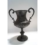 A Victorian Britannia metal two handled vase,