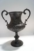 A Victorian Britannia metal two handled vase,