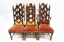 A Mexican set of six dining chairs with pierced backs