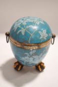 A 19th century earthenware tea caddy of egg form, with plated mount and handles,