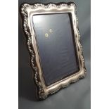 A modern silver photograph frame, of rectangular shaped outline, 27 cm by 22 cm, image area 20.
