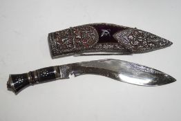 A presentation Kukri of the 4th Gurkha Rifles, horn handled with lion's mask and white metal mounts,