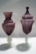 A Victorian amethyst and opalescent glass vase and cover, 40cm high, and matching ewer, 36cm high,