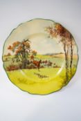 A Royal Doulton fox hunting scene plate with shaped edge, printed factory marks, 26.
