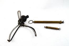 A Saltes 416 and 2016 fishing scales and a bait catapult
