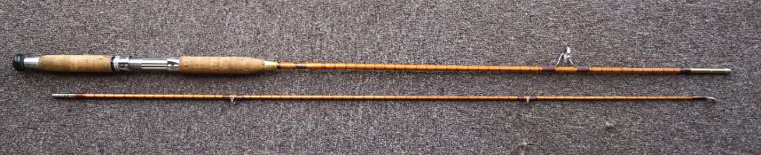An Allcocks Patrician split cane two piece rod,
