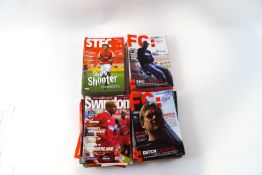 A large quantity of Swindon Town programmes