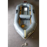 An Avon Red Seal 10'3" dinghy together with oars, footpump,