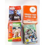 A quantity of football programmes,