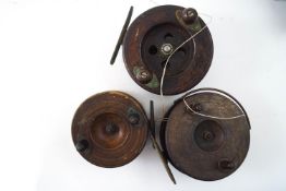 Three vintage wooden reels
