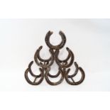 A horseshoe wine rack